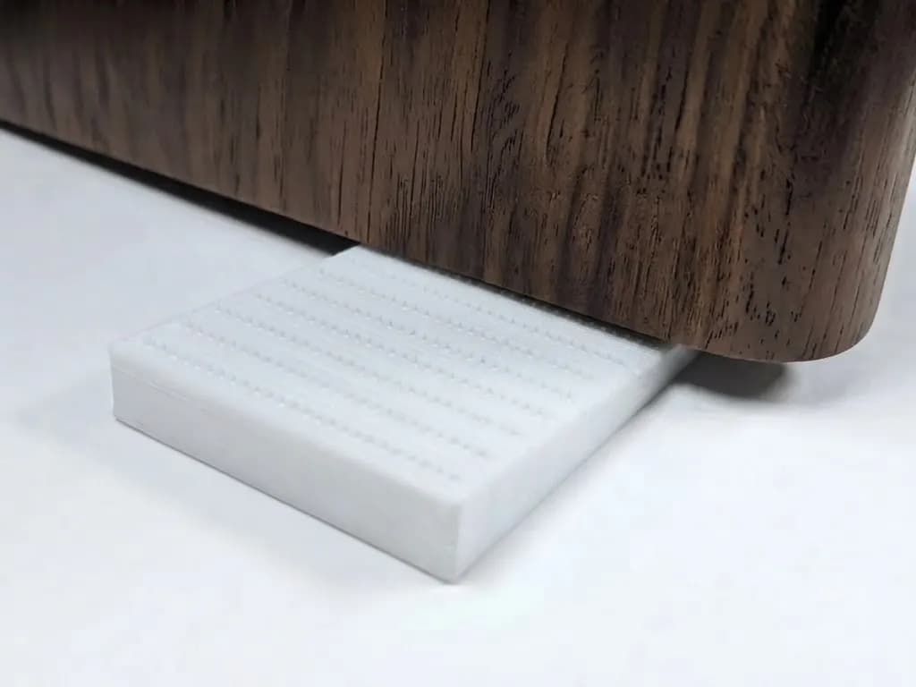 Низькопрофільний фіксатор, упор дверей та вікон, білий, 52x30x6 мм - зображення 1