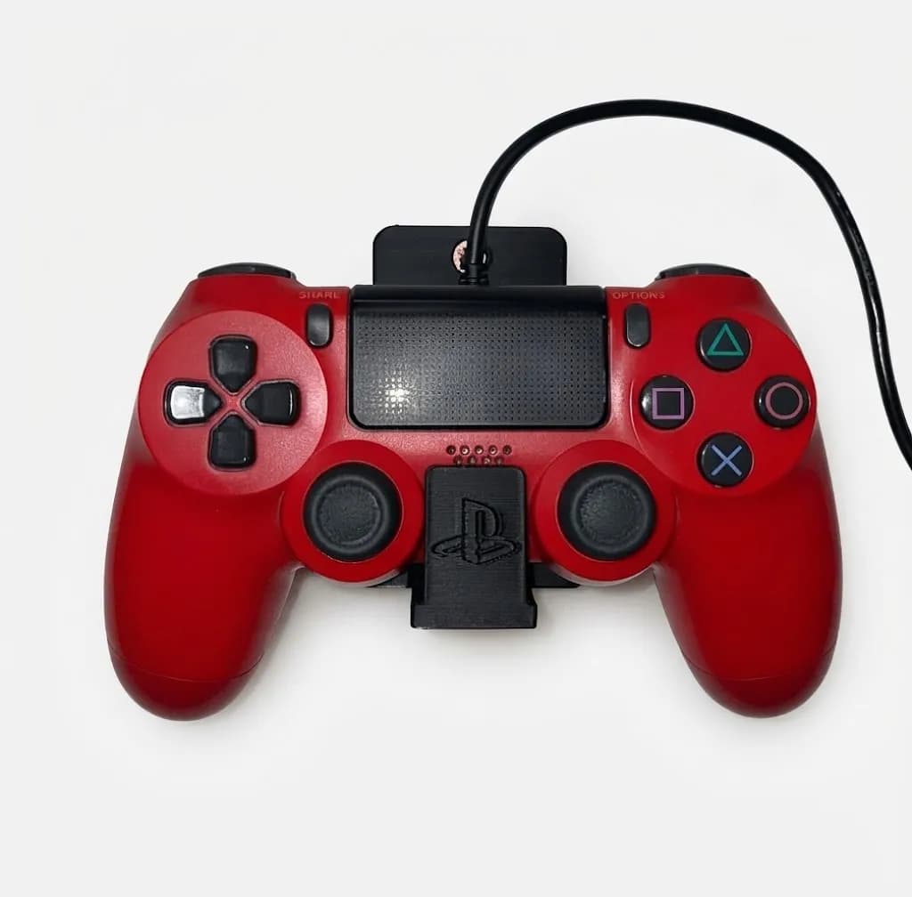 Настінний тримач для контролера PS4 (без гвинтів), чорний - зображення 1